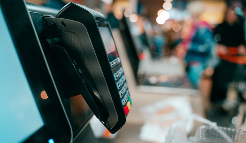 Retail point of sale terminal at a store checkout counter